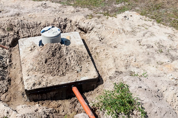 during septic tank pumping, a professional will empty the tank and inspect for any issues or damage